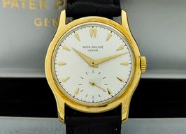 Patek Philippe Calatrava 2450 (1955) - Silver dial 35 mm Yellow Gold case